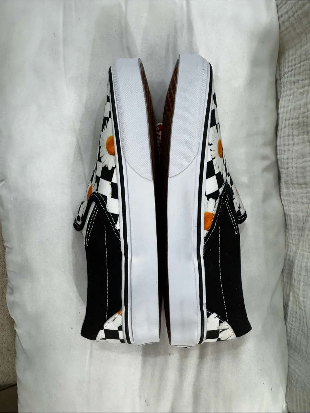 Vans Kids Slip-On Sneakers Black/White Daisy with Orange Centers